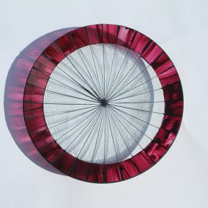 Red and transparent bowl in the Facets collection.