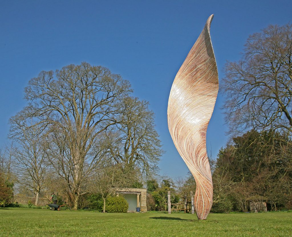 An archived large sculpture by Rebecca Newnham, mosaiced in glass with copper enamel. Photographed in winter by David Bird.