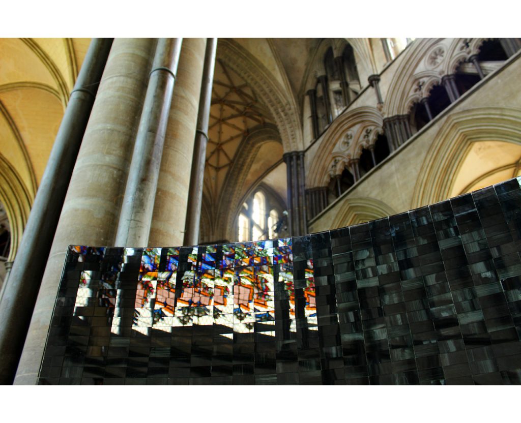 One of two large, black enameled glass sculptures by Rebecca Newnham called Sound Parabolas in Salisbury Cathedral. Photographed by David Bird.